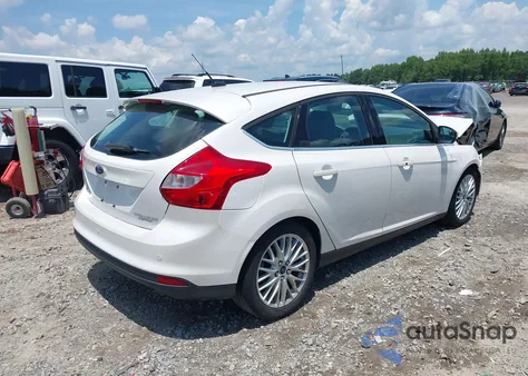 2014 Ford Focus Titanium from USA, damaged, VIN 1FADP3N27EL309324